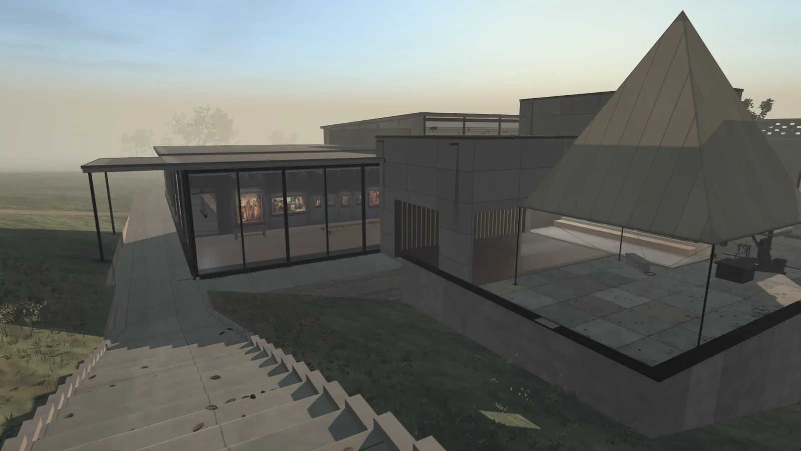 Seen from the head of a stair: a long low gallery with a glass wall and framed pictures inside, and beside it a square court under a tall pyramid of linen on thin poles. Meadows and haze behind. A still from the museum's film.