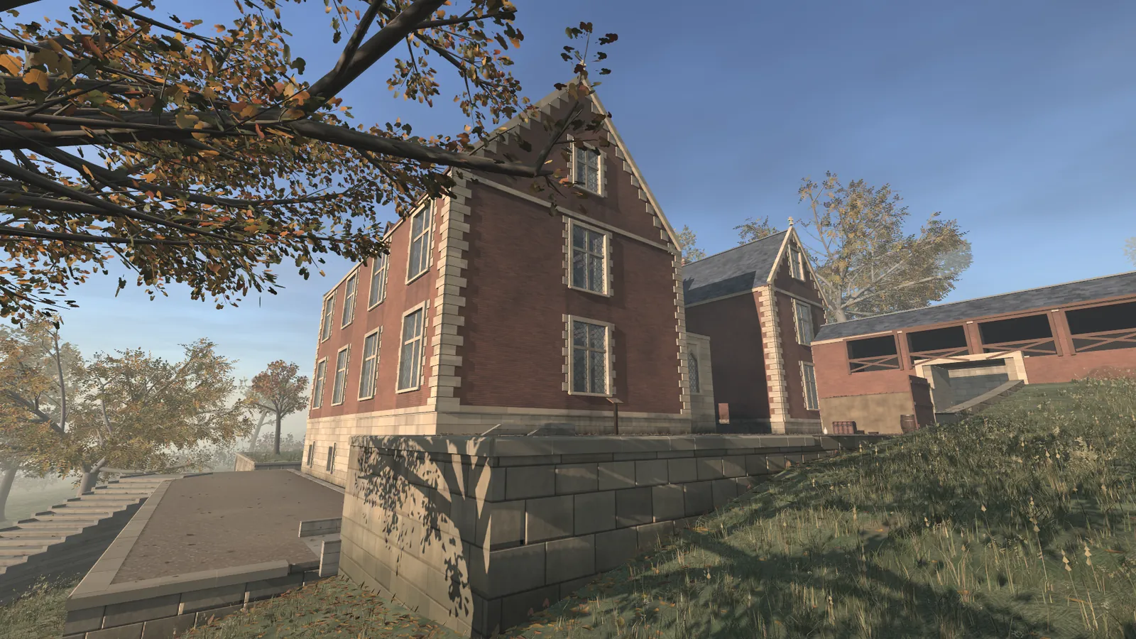 A tall brick house with stone corners stands on a walled terrace in low sun, under a branch with autumn leaves. A still from the museum's film. The house is a reconstruction built in code.