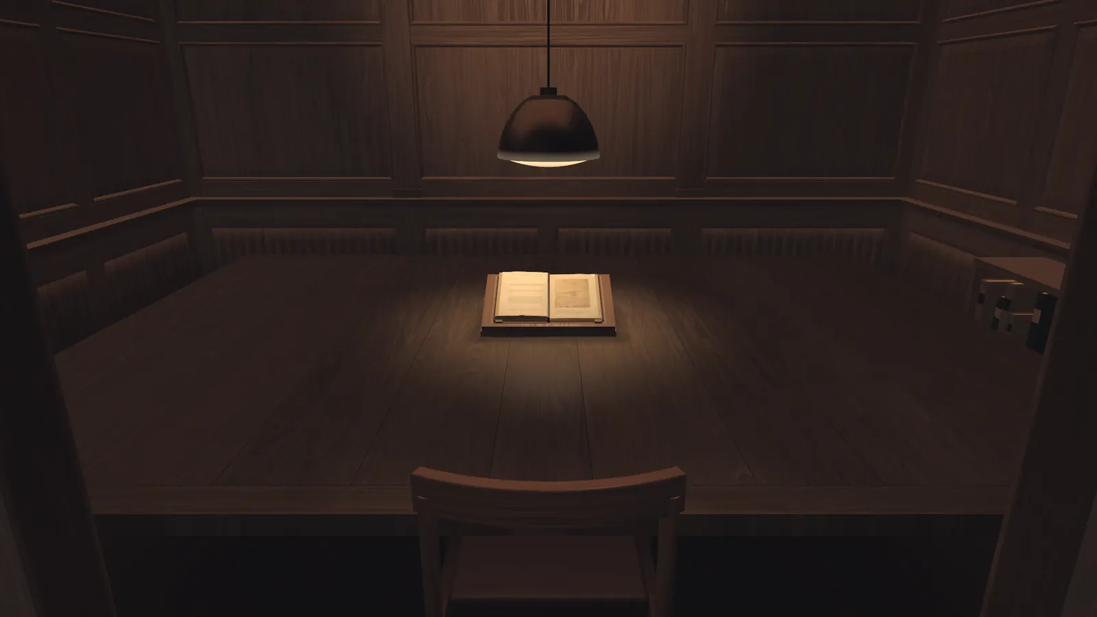 A dark panelled room with one hanging lamp. Under the lamp an open book lies on a long table, and a chair stands in front of it.